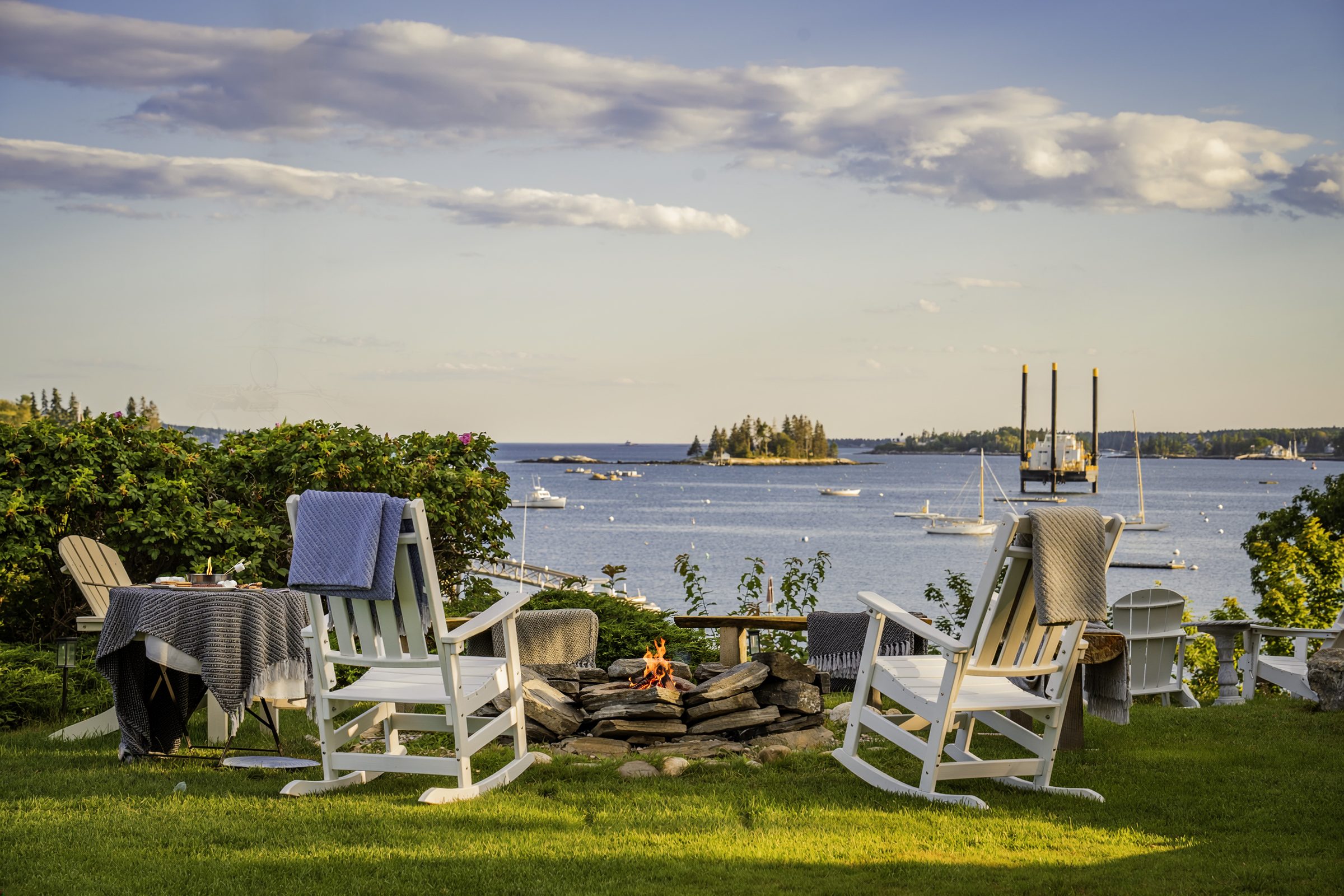 Adirondack chairs facing Boothbay Harbor